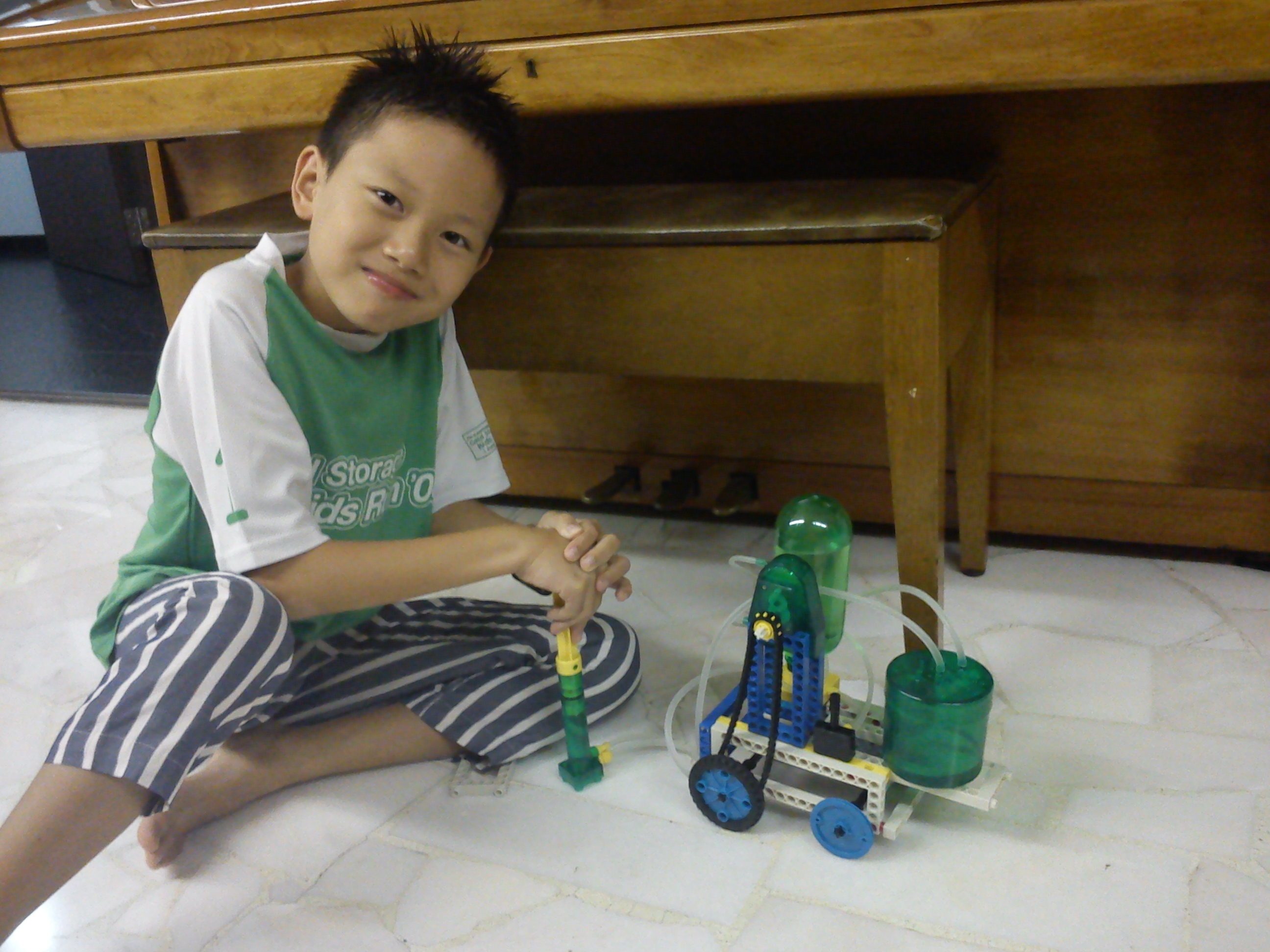 Elias with Water recycling vehicle
